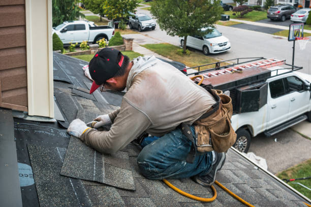 Professional Roofing technician working in San Bernardino, CA